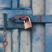 gold padlock locking door 164425