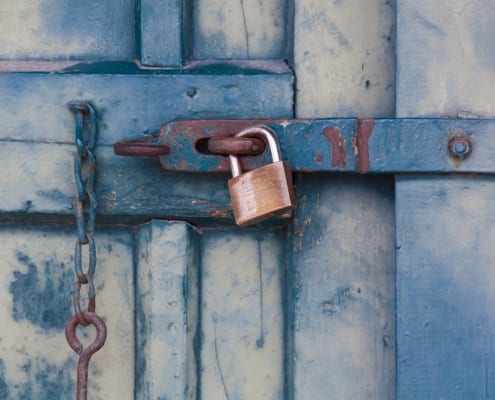 gold padlock locking door 164425