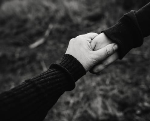 black and white photo of holding hands 735978